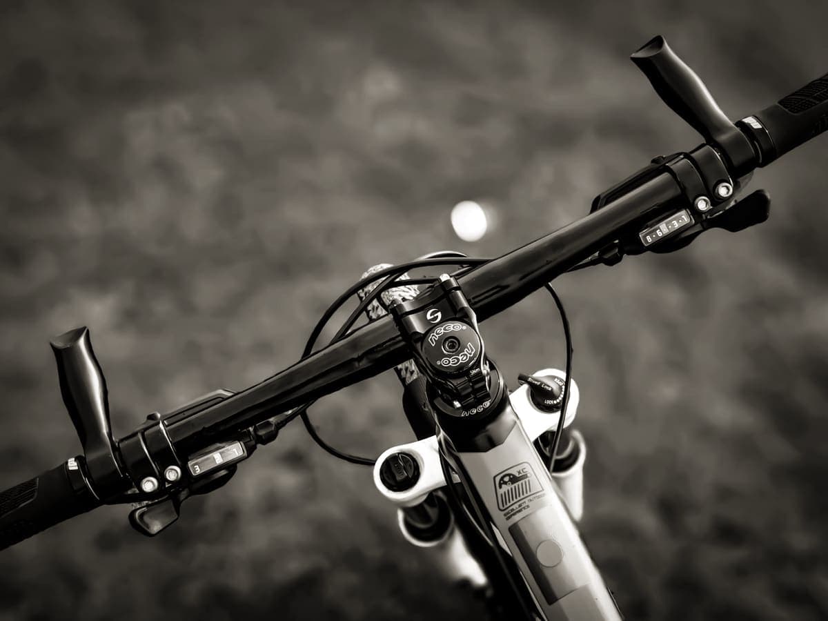 Bicycle handlebar and components on a workshop bench